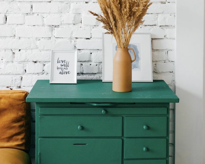 picture of green drawers and some decoration